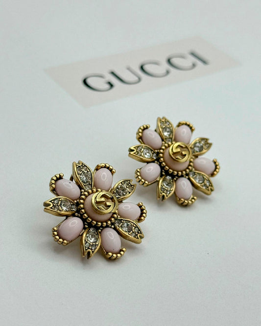 Arete Gucci flor oro viejo