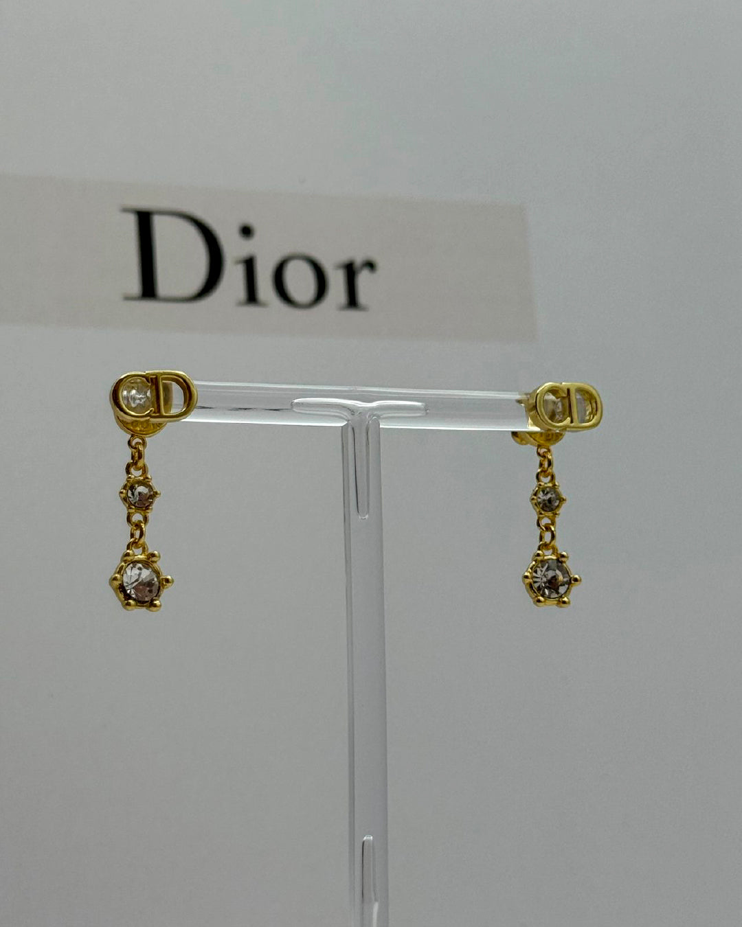 Arete Dior dorado CD