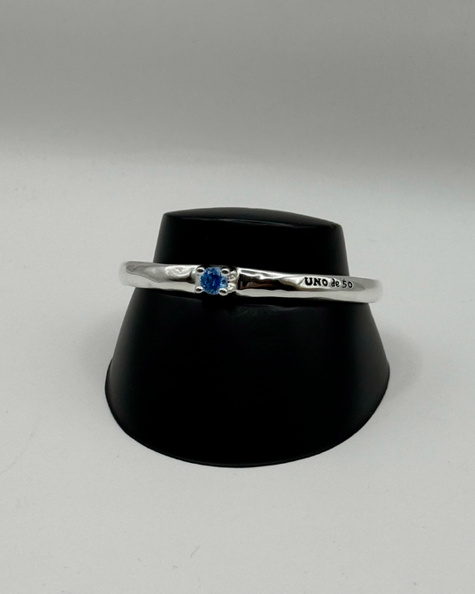 Brazalete uno de 50 acero bañado en plata